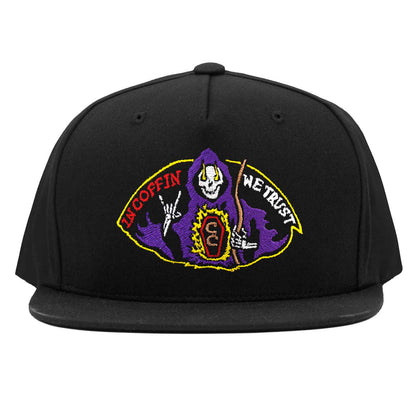 The saint grim reaper throwing up rock n' roll sign while a coffin burns with truth. In coffin we trust, fuel the fire! Embroidery on Cruise Coffin snapback. Ride the darkside!